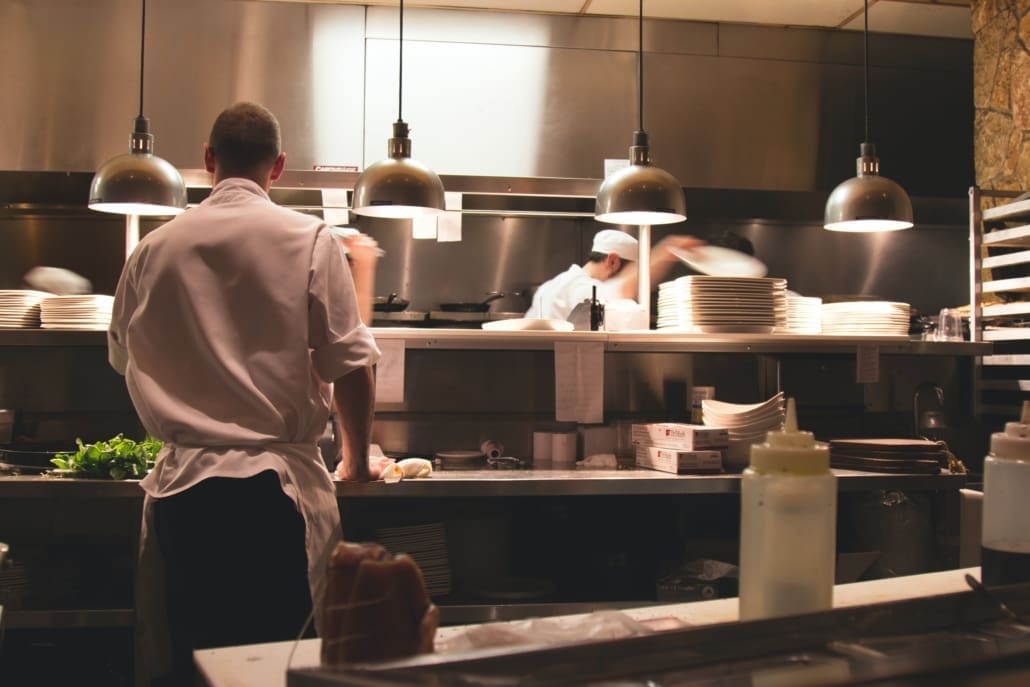 A restaurant staff cleans up after their shift.