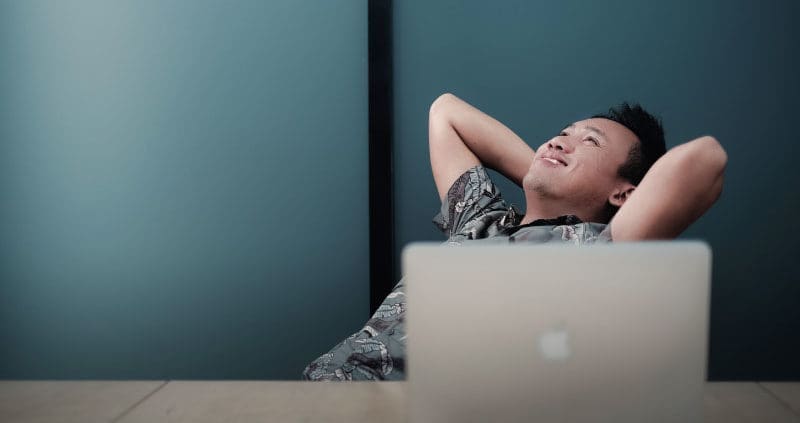 a person looking up from their desk