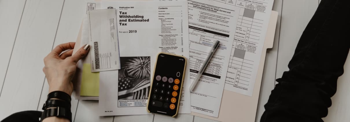 A broker goes over his taxes for his real estate business.