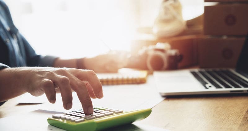 a person using a calculator