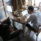 restaurant owner working at a table