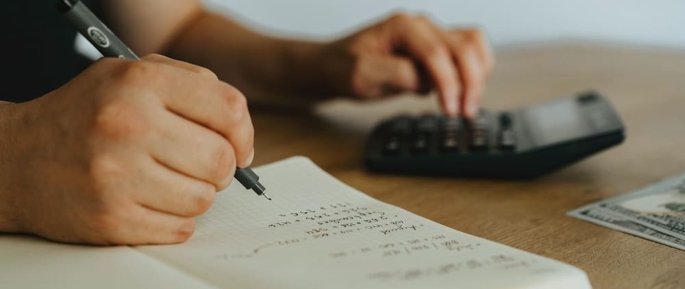 a person using a calculator