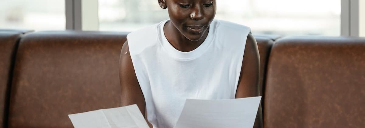 a person looking at papers