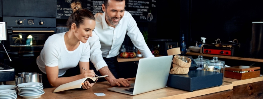 small business owners doing accounting and bookkeeping