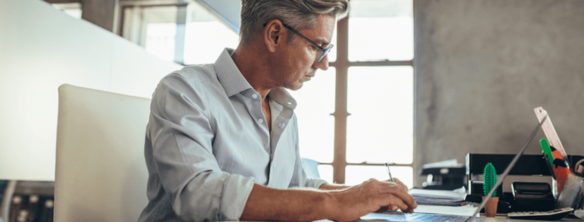 businessman working at his desk