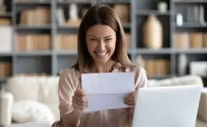 a person looking at a paper