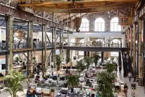 A large warehouse that is converted into an office space