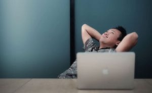 a person looking up from their desk