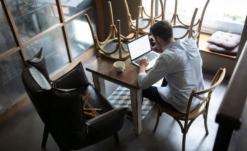 restaurant owner working at a table