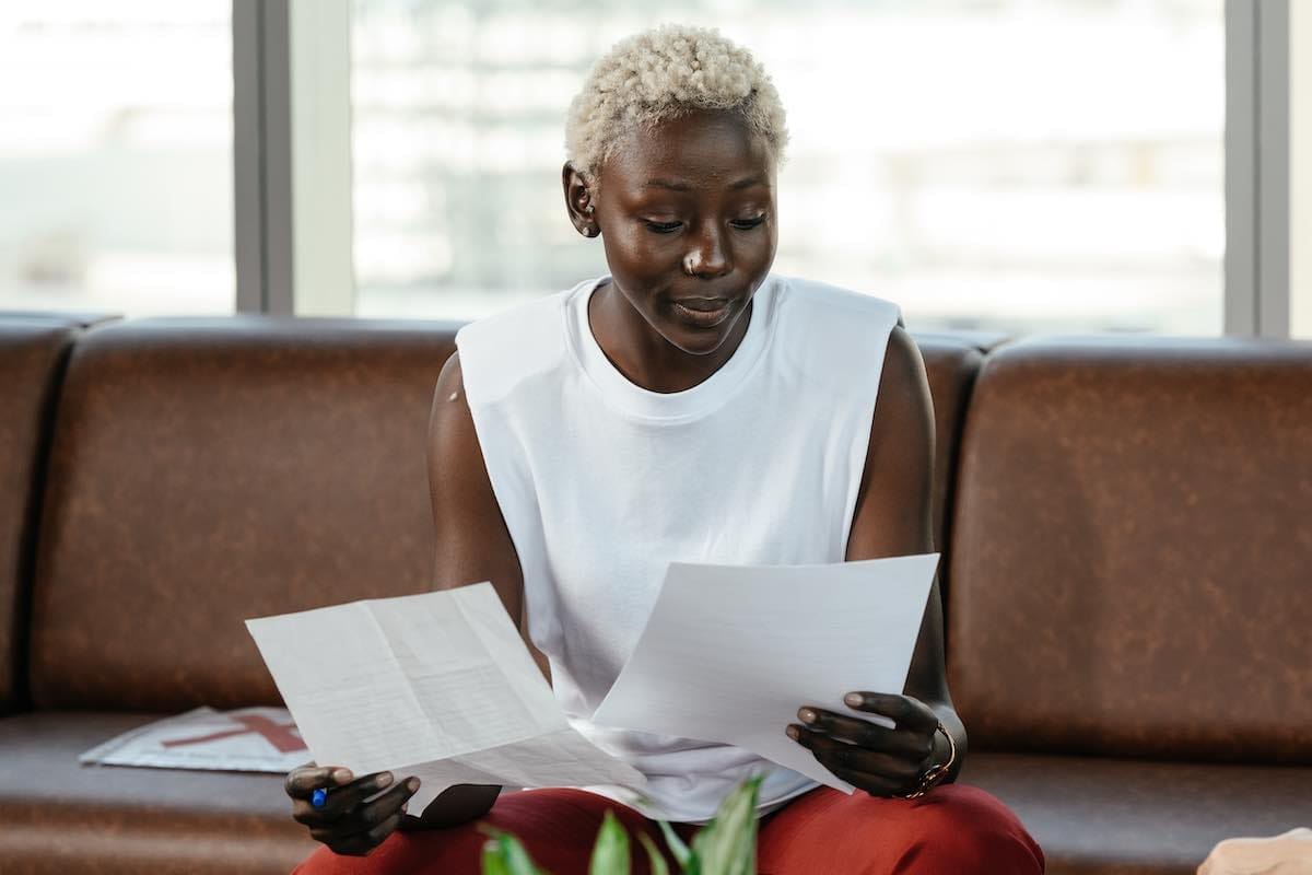 a person looking at papers