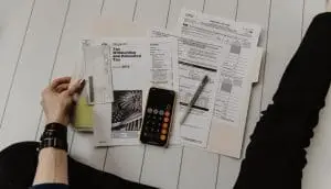 a person looking at tax papers